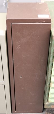 Lot 1408 - Brown metal ammunition cabinet, 8x9¼x32¼ ins