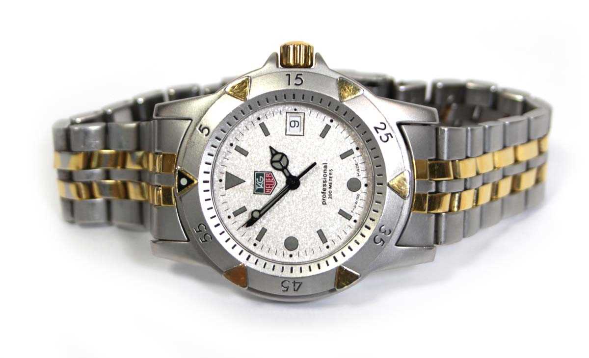 Lot 488 - A unisex stainless steel wristwatch by Tag...