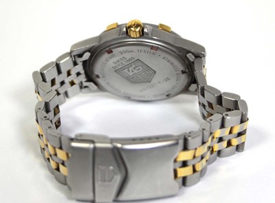 Lot 488 - A unisex stainless steel wristwatch by Tag...