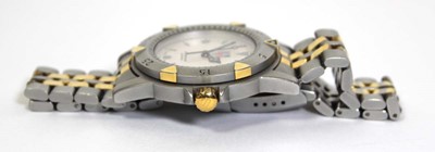 Lot 488 - A unisex stainless steel wristwatch by Tag...