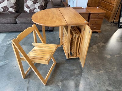 Lot 1009 - Drop leaf occasional table with stowaway chairs