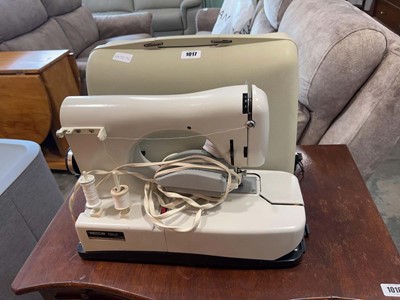 Lot 1017 - Cased sewing machine