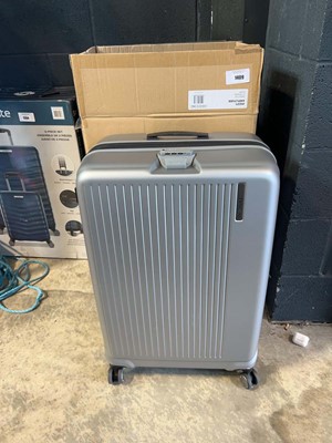 Lot 1409 - Boxed Samsonite suitcase in grey