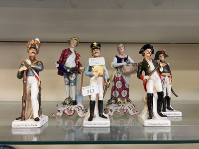 Lot 312 - Four ceramic military figures along with two...
