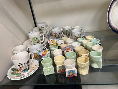 Lot 321 - An assortment of novelty mugs, cups and...