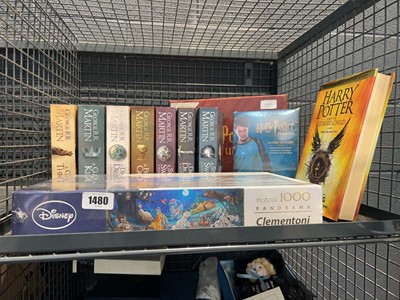 Lot 1480 - Cage containing Hunger Games book set, Harry...