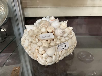Lot 358 - A heart shaped trinket box covered in shells