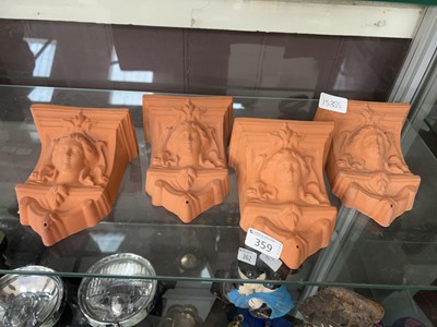 Lot 359 - Four classical terracotta wall pockets