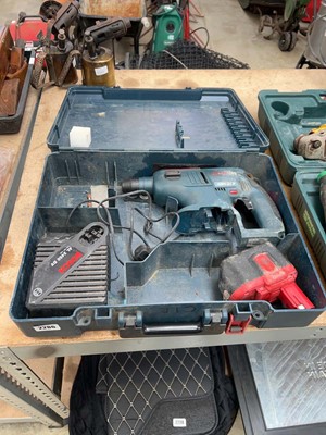 Lot 2286 - Cased Bosch 24V hammer drill with battery and...