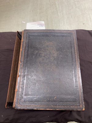Lot 379 - A large leather bound family bible