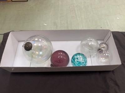 Lot 380 - A box containing six glass baubles
