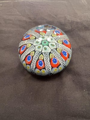 Lot 381 - A decorative millefiori glass paperweight