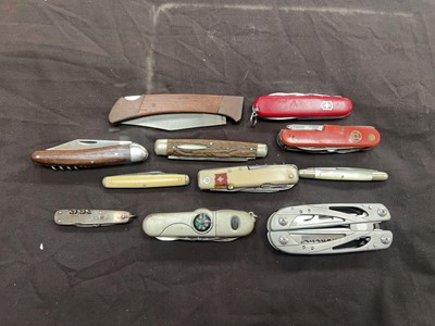 Lot 385 - A bag containing an assortment of multi tools...