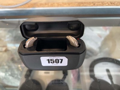 Lot 1507 - Pair of Oticon More-1 gold hearing aids and...