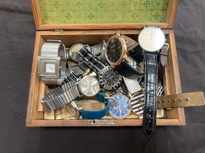 Lot 395 - A box of assorted wristwatches by various...