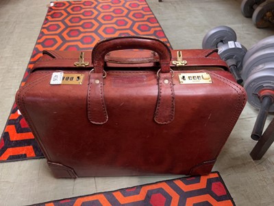 Lot 416 - A tan leather combination lock briefcase by Amiet