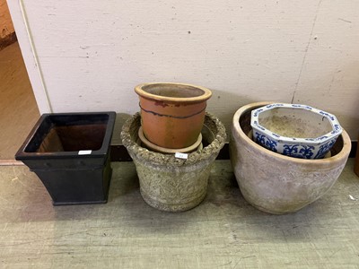 Lot 22 - An assortment of eight various garden pots to...