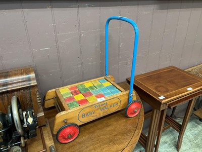 Lot 59 - A mid-20th century Tri-Ang baby walker along...