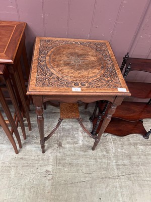 Lot 61 - A carved oak occasional table on turned...