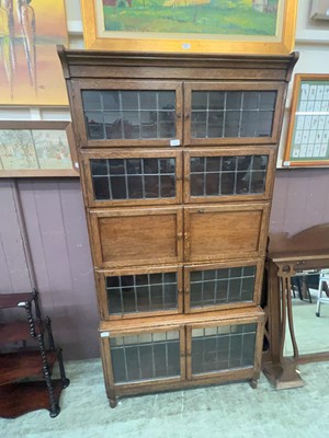 Lot 66 - A five section oak sectional bureau bookcase...