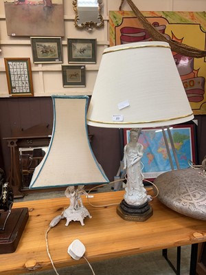 Lot 89 - A white ceramic table lamp with cherub column...