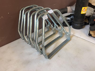 Lot 125 - Four chrome bicycle stands