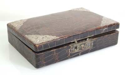 Lot 301 - An Edwaridan silver mounted crocodile skin...