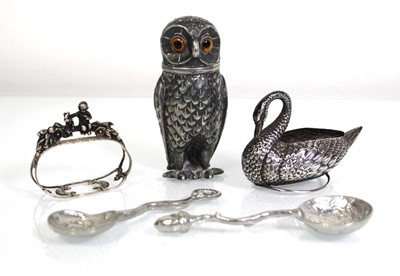Lot 315 - A Continental silver napkin ring modelled as a...