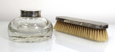 Lot 316 - A silver mounted cut glass inkwell of squat...
