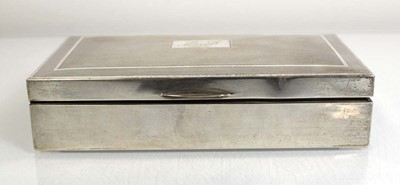 Lot 317 - An engine turned silver cigarette box of...