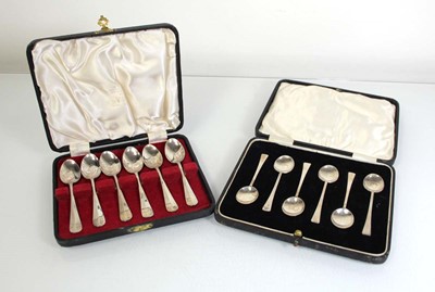 Lot 322 - Two cased sets of six silver teaspoons, Viners,...