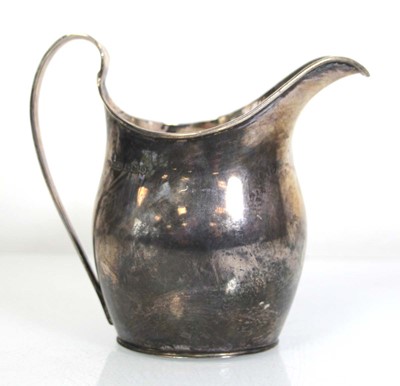 Lot 325 - A silver cream jug of helmet form, maker JR&S,...