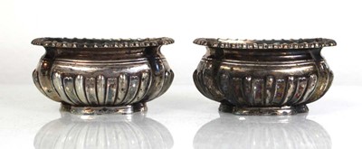 Lot 334 - A pair of Edwardian silver salts of oval form...