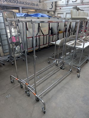 Lot 304 - Five height adjustable mobile clothes rails