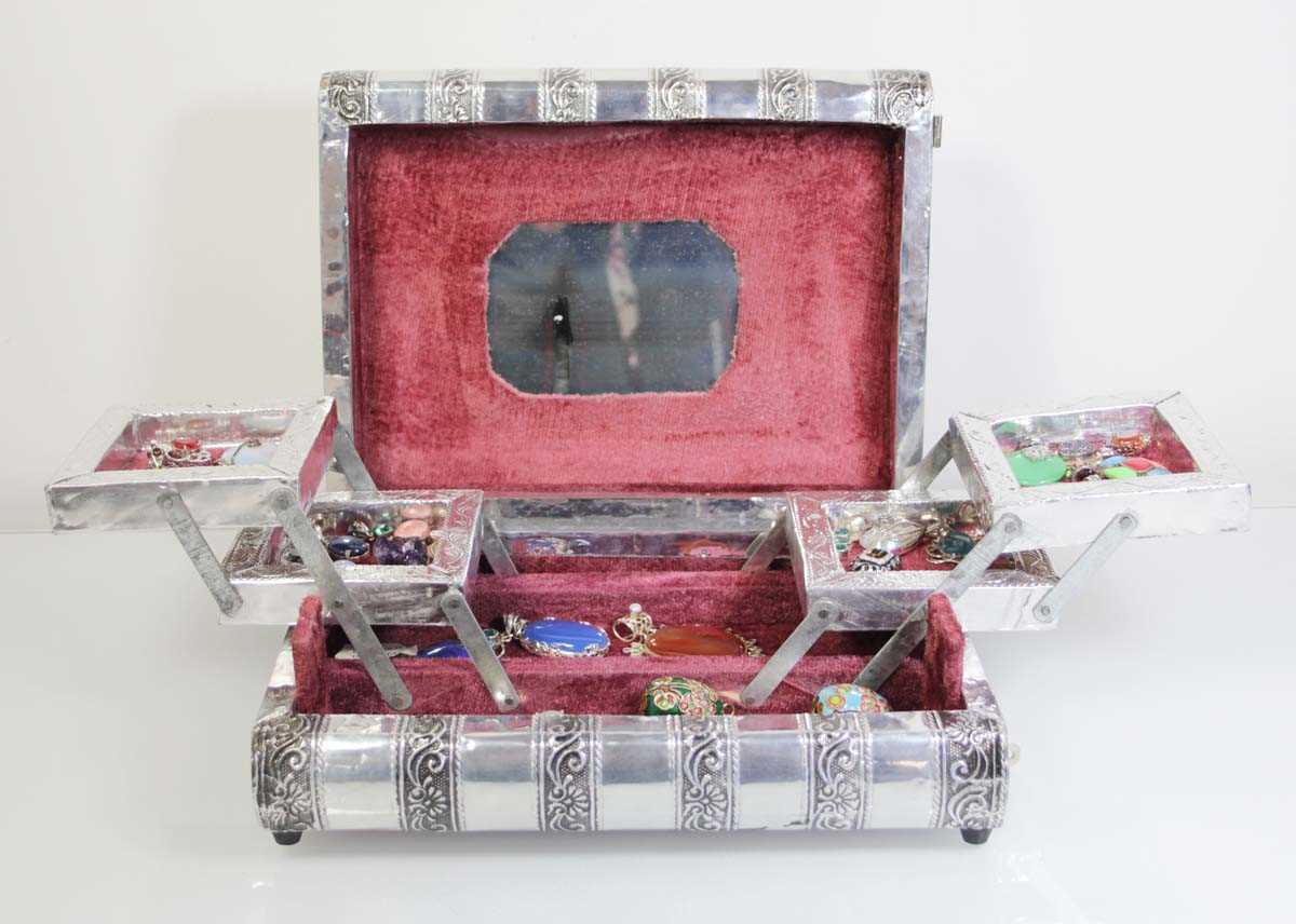 Lot 745 - A jewellery box containing thirty-three silver,...