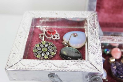 Lot 745 - A jewellery box containing thirty-three silver,...