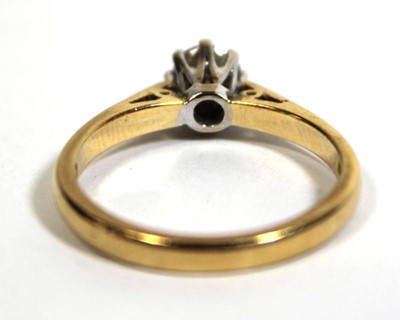 Lot 747 - An 18ct yellow gold ring set brilliant cut...