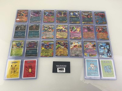 Lot 1433 - Approx. 25 Top Loaded Pokémon cards from...