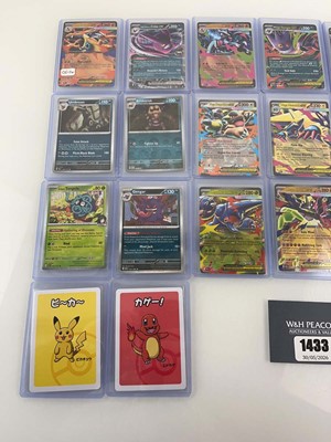 Lot 1433 - Approx. 25 Top Loaded Pokémon cards from...