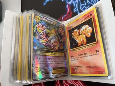 Lot 1439 - Quantity of tins of loose Pokémon cards and a...