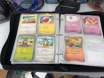Lot 1439 - Quantity of tins of loose Pokémon cards and a...