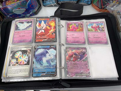 Lot 1439 - Quantity of tins of loose Pokémon cards and a...