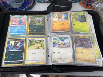 Lot 1439 - Quantity of tins of loose Pokémon cards and a...