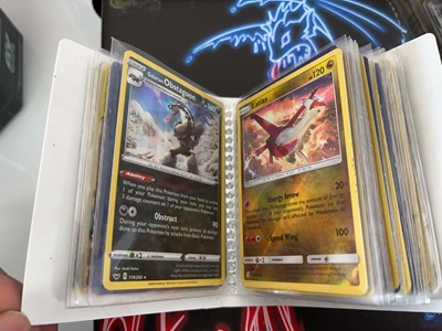 Lot 1439 - Quantity of tins of loose Pokémon cards and a...