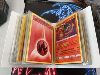Lot 1439 - Quantity of tins of loose Pokémon cards and a...