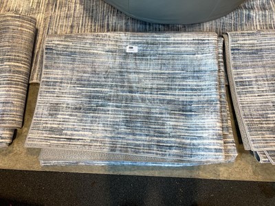 Lot 1002 - Wyatt & Ash machine washable area rug in blue,...