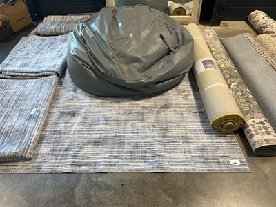 Lot 1004 - Wyatt & Ash machine washable area rug in blue,...