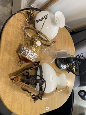 Lot 1024 - 2 vintage lanterns, 1 having a glass funnel