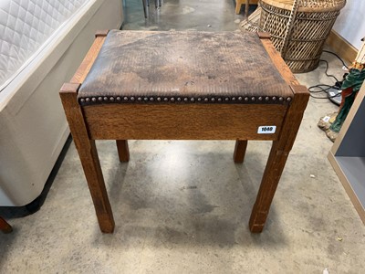 Lot 1040 - Dark oak stool with brown leatherette seat and...