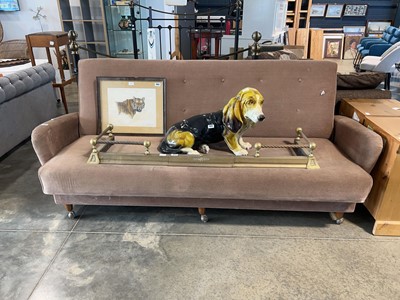 Lot 1044 - Mid century brown fabric upholstered sofa on...